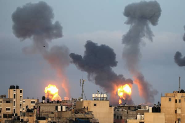 Flames and smoke rise during Israeli air strikes amid a flare-up of Israel-Palestinian violence, in the southern Gaza Strip May 11, 2021. REUTERS/Ibraheem Abu Mustafa