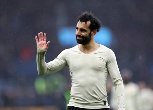 Soccer Football - Premier League - Burnley v Liverpool - Turf Moor, Burnley, Britain - February 13, 2022 Liverpool's Mohamed Salah celebrates after the match Action Images via Reuters/Carl Recine EDITORIAL USE ONLY. No use with unauthorized audio, video, data, fixture lists, club/league logos or 'live' services. Online in-match use limited to 75 images, no video emulation. No use in betting, games or single club /league/player publications.  Please contact your account representative for further details.