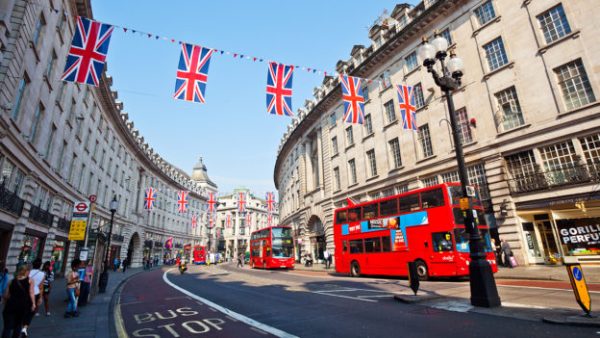Regents St with red buses and bunting