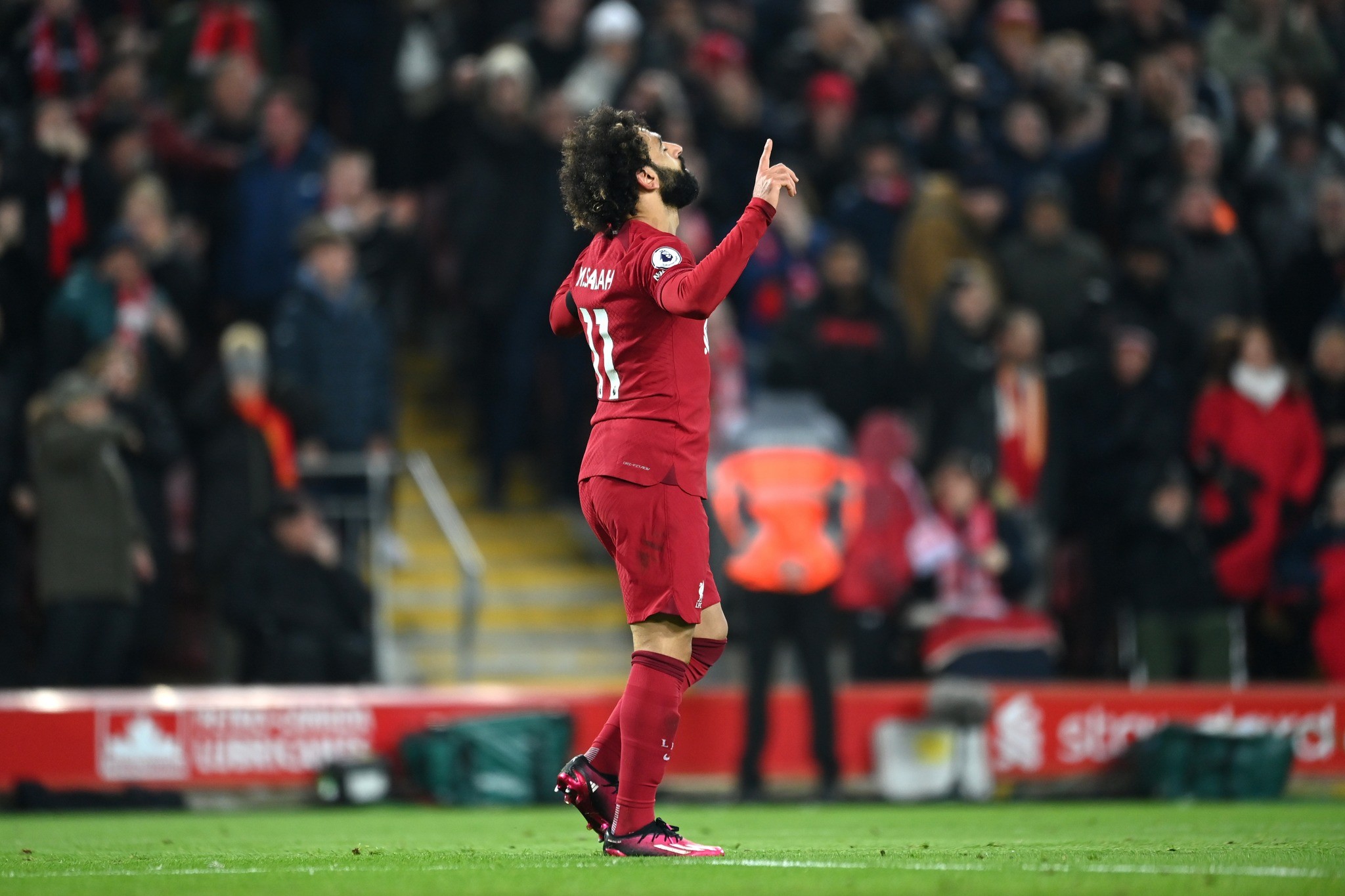 LIVERPOOL, ENGLAND - FEBRUARY 13: Mohamed Salah of Liverpool celebrates after scoring the team's first goal during the Premier League match between Liverpool FC and Everton FC at Anfield on February 13, 2023 in Liverpool, England. (Photo by Michael Regan/Getty Images)