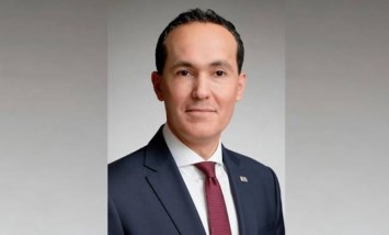 الدكتور محمد عوض رئيس هيئة الاستثمار والمناطق الحرة 